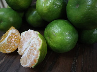 fresh food background of  green tangerines design for healthy diet