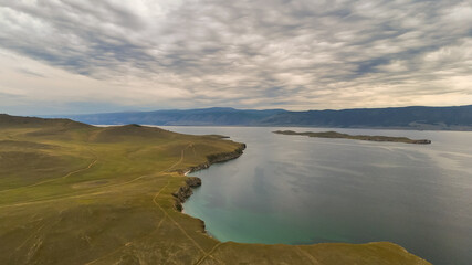 Fototapeta premium drone flight over the shore of Lake Baikal at sunset