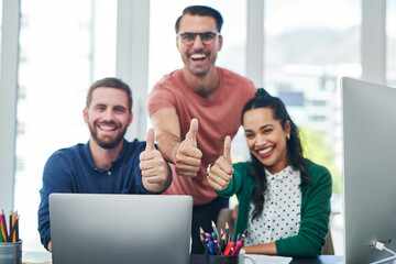 Happy, portrait and business people with thumbs up for teamwork, success or winning at office desk. Young, group or employees with smile, like emoji or yes sign for good job, well done or thank you