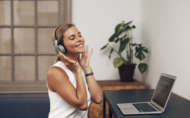 Woman, headphones and employee with audio in office, streaming song and copywriter with laptop....