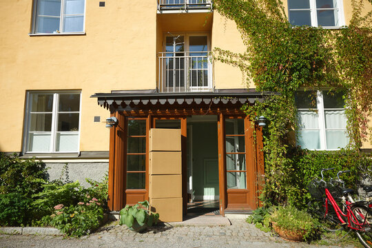 Stack of boxes outside residential building