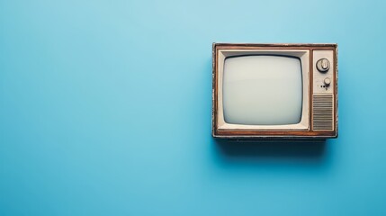 a old vintage tv on color background. retro technology. flat lay top view hero header. vintage color styles. copy space for text