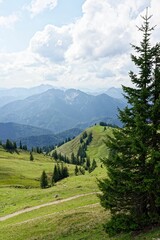 Scenic view of green hills and mountains.