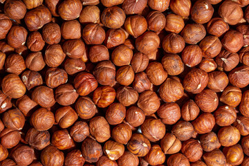 Scattered Peeled Hazelnut - Top View. Background from Hazelnuts. Natural High-Calorie Snacks