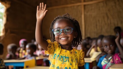 Young girl enthusiastically raising her hand in a colorful classroom during a lively lesson in a rural community
