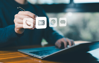 using the laptop show the icon ( address, phone, email, call ) to contact customer support. help from mail websites digital technology of business contact service. contact us concept.