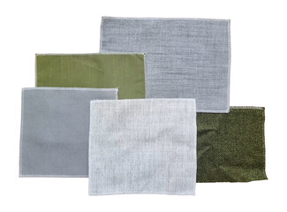 set of drapery curtain fabric samples in top view contains gret and green color isolated on background with clipping path. selected terry or canvas fabric type for furniture or blinds design.