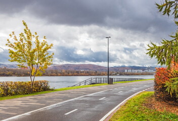 Autumn city landscape. Krasnoyarsk city embankment. Golden autumn.