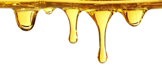 Thick golden oil dripping smoothly, isolated on transparent cutout background