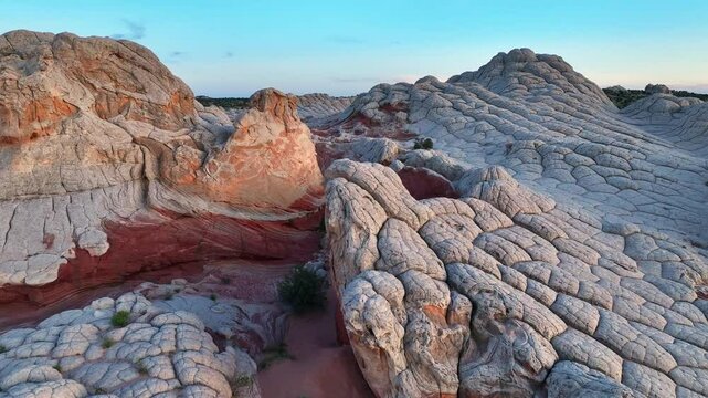Vibrant sunset over White Pocket's unique rock formations