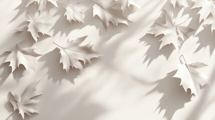 A serene arrangement of white leaves casting soft shadows on a neutral background.