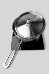 a frying pan with a stainless steel lid