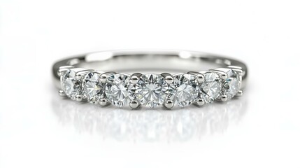 Diamond eternity band with channel setting on neutral background.