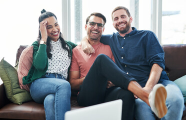 Business people, laughing and portrait on sofa with contact us, laptop and web designer team. Tech,...
