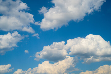 White clouds on a clear blue sky