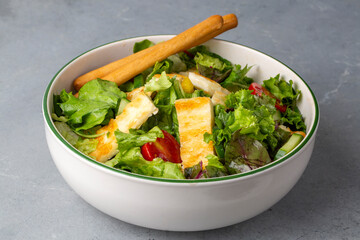 Grilled Halloumi Cheese Salad. Food concept photo.
