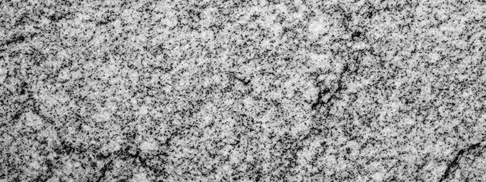 Aufkleber a textured surface resembling granite or marble with intricate patterns.