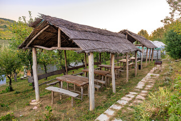 A small village with a few tables and a few buildings