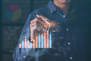 Business pointing exponential arrow and financial graph for business investment growth. Financial, data analysis, goal,success and money concept.