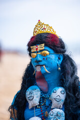Kulasai Dasara, Portrait of indian woman with painted face and dressed as hindu god kali to perform the rituals of kulasai dasara cult festival of Tamil culture.