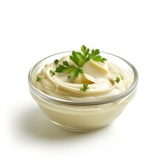 Mayonnaise on a glass bowl  isolated on a white background
