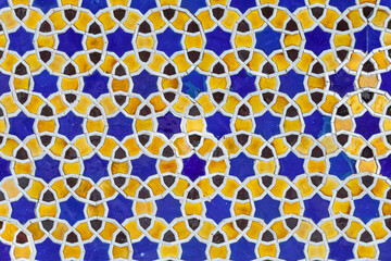 Traditional colorful geometric Uzbek ornament. Texture background close-up