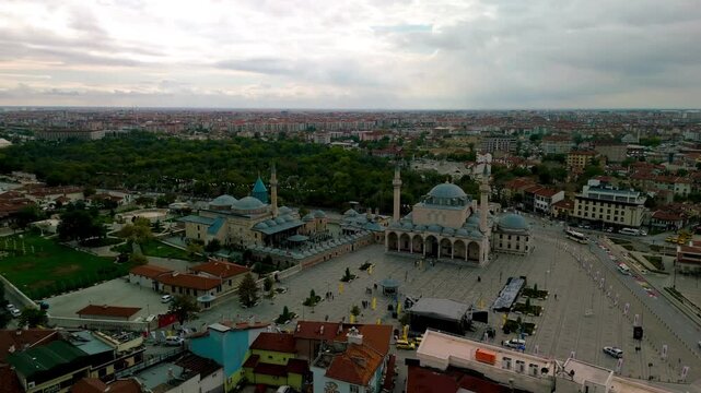 Konya aerial footage with Selimiye Camii, Mevlana Meydani, and Mevlana Muzesi in view. 