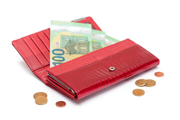 Opened Red Leather Women Purse with One Hundred Euro Banknotes Inside and Euro Cent Coins - Isolated on White Background. A Wallet Full of Money Symbolizing Wealth and Success - Isolation