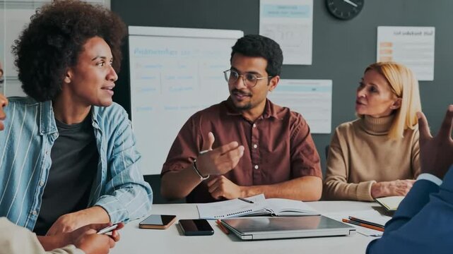 Medium AI generated shot of cheerful diverse female and male immigrants studying foreign language together in group, brainstorming new topic or discussing rules during class at school