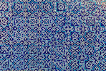 Geometric traditional Islamic ornament. Fragment of a ceramic mosaic.Abstract background.