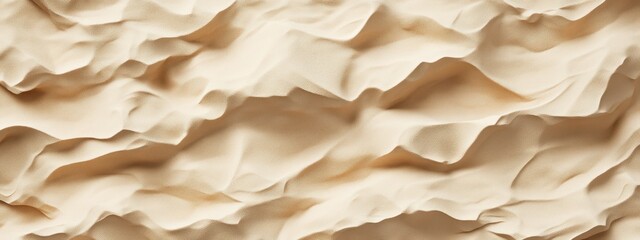 Obraz premium A textured surface resembling crumpled fabric or paper in neutral tones.