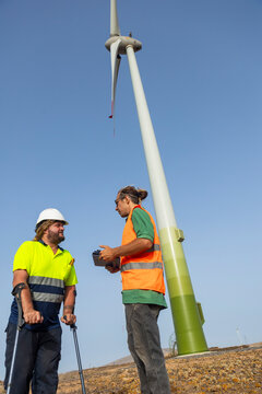 Inclusive inspection at wind turbine site with disabled worker