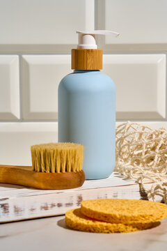 Beautiful blue spa cosmetic bottle with natural accessories
