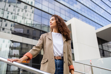Confident Brazilian businesswoman in urban setting