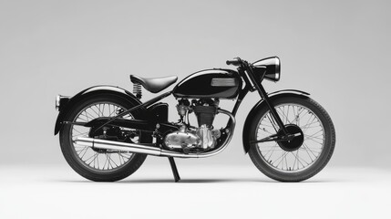 Obraz premium A classic black motorcycle with chrome accents, set against a white background.