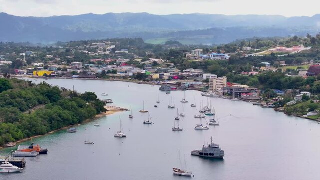Port Vila, Efate, Vanuatu - Various Vessels Anchored in the Picturesque Tropical Harbor City - Aerial Drone Shot