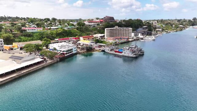 Port Vila, Efate, Vanuatu - A Scenic View of the Tropical Coastal Town Showcasing the Grand Hotel and Casino - Aerial Drone Shot