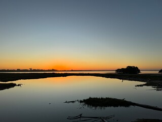 Fototapeta premium sunset over the river
