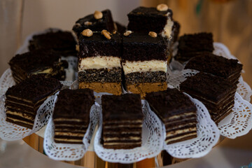 Deliciously Layered Chocolate Desserts on a Decorative Platter