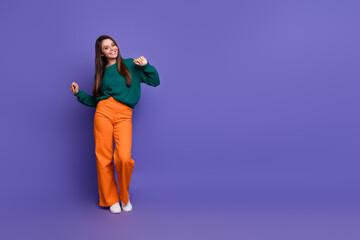 Full body portrait of pretty young girl dance empty space ad isolated on violet color background