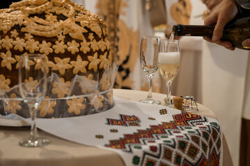 Elegant Celebration Setup Featuring Traditional Cake and Champagne