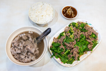 Fresh beef soup, and stir fry green vegetables and beef in Tainan, Taiwan