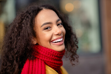 Close up photo of cheerful nice girl wear stylish jacket walk downtown weekend autumn day outdoors outside