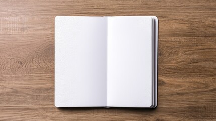 A blank notebook lies open on a wooden surface, inviting creativity and ideas to be written down.