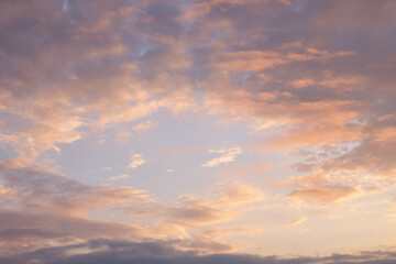 Beautiful sunset sky with pink clouds. Background or template.