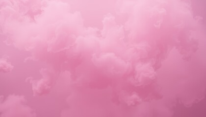 Fototapeta premium Fluffy pink clouds drift and blend together, casting a serene ambiance that evokes feelings of tranquility and creativity in the early morning light
