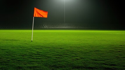 Obraz premium Corner flag on a football pitch, with the grass glistening under stadium lights, and rows of empty seats creating a quiet atmosphere. --chaos