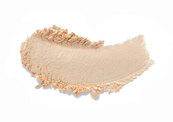 Beige smudge pressed or loose powder, eye shadow or foundation powder swatch isolated on white