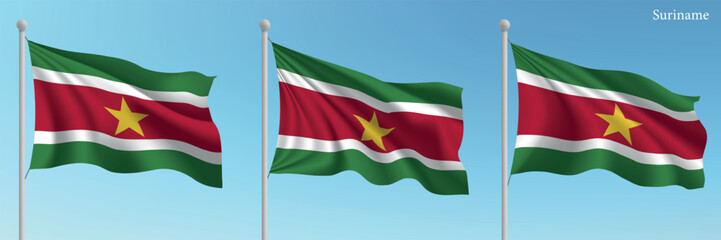Set of three flags of Suriname waving on flagpoles