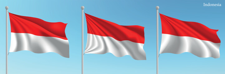 Set of three flags of Indonesia waving on flagpoles